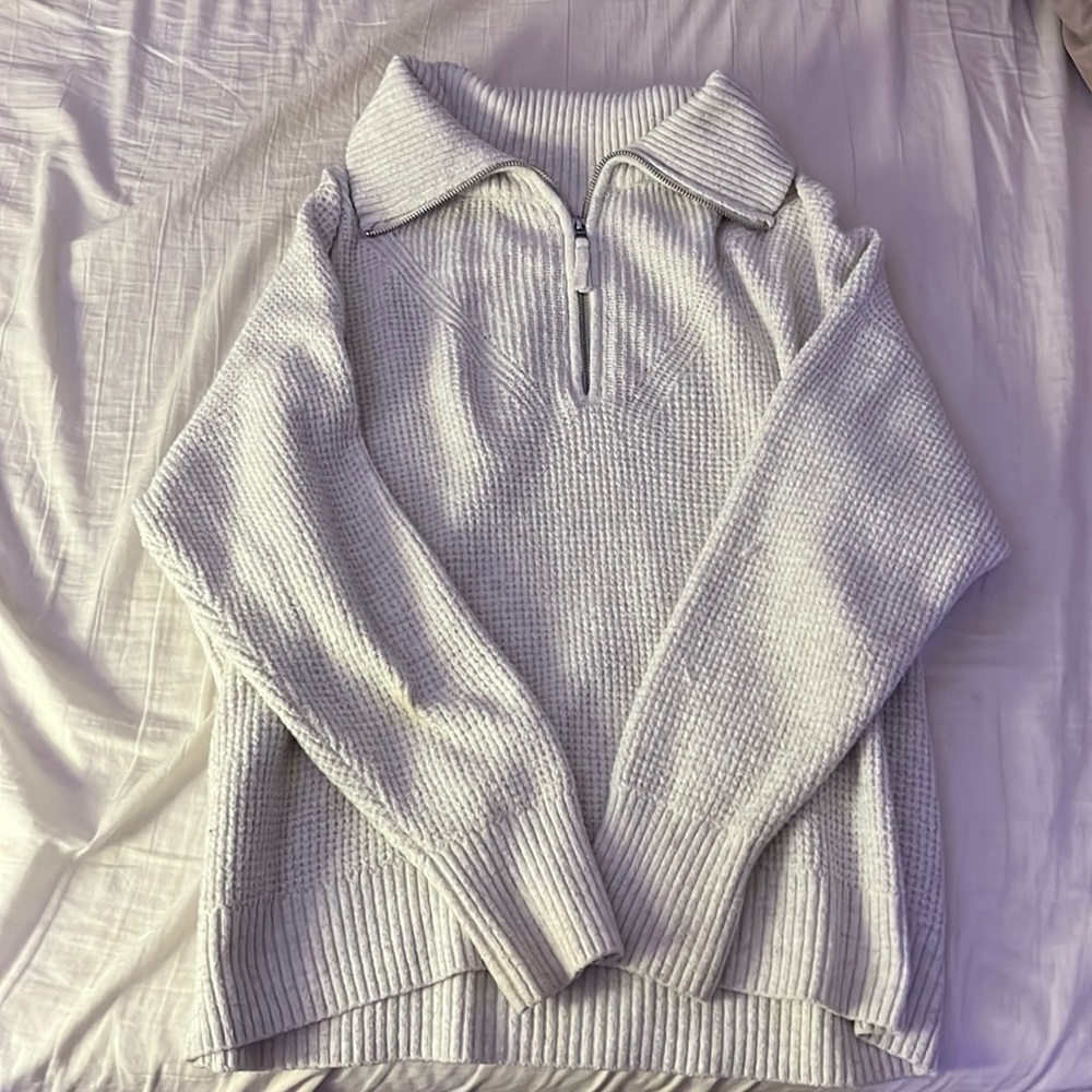 Aerie knit waffle quarter zip up sweater in beige.